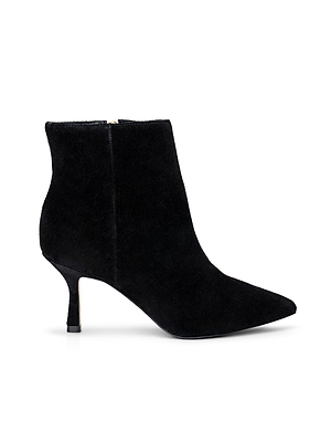 The Sylvie Suede Bootie by L'AGENCE is a black suede bootie with a pointed toe, slim mid-height heel, side zipper, and sleek minimalist design.