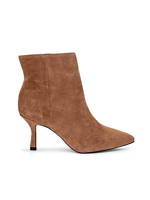 The L'AGENCE Sylvie Suede Bootie features tan suede, a pointed toe, and a slim mid-height heel, displayed in side profile on a white background.