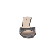 The Arleen Kitten-Heel Mule is a women’s open-toe mule in glossy black crocodile-embossed leather, shown from the front with a beige memory foam insole and a mid-height heel, set against a plain white background.