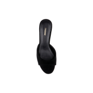 Introducing the Arleen Kitten-Heel Mule: a black suede, open-toe mule with a slip-on design, single wide strap, and branded L’AGENCE insole. Displayed from a top-down view against a white background, this low-heel mule blends elegant style with comfortable ease.