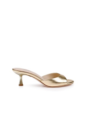 The Arleen Kitten-Heel Mule is a gold leather slip-on sandal with an open toe and a chic low kitten heel, shown in side profile against a white background.