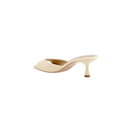 Light yellow leather Arleen Kitten-Heel Mule with an open-toe and kitten heel.
