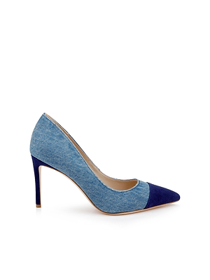 The Kendelle Denim Pump features a denim-textured body with a navy suede cap toe and heel, displayed in profile against a white background.