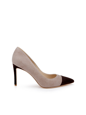 The Kendelle Suede Pump features light tan suede, a pointed cap toe with contrasting dark brown suede tip and heel, and a memory foam insole. Shown in profile on a white background.