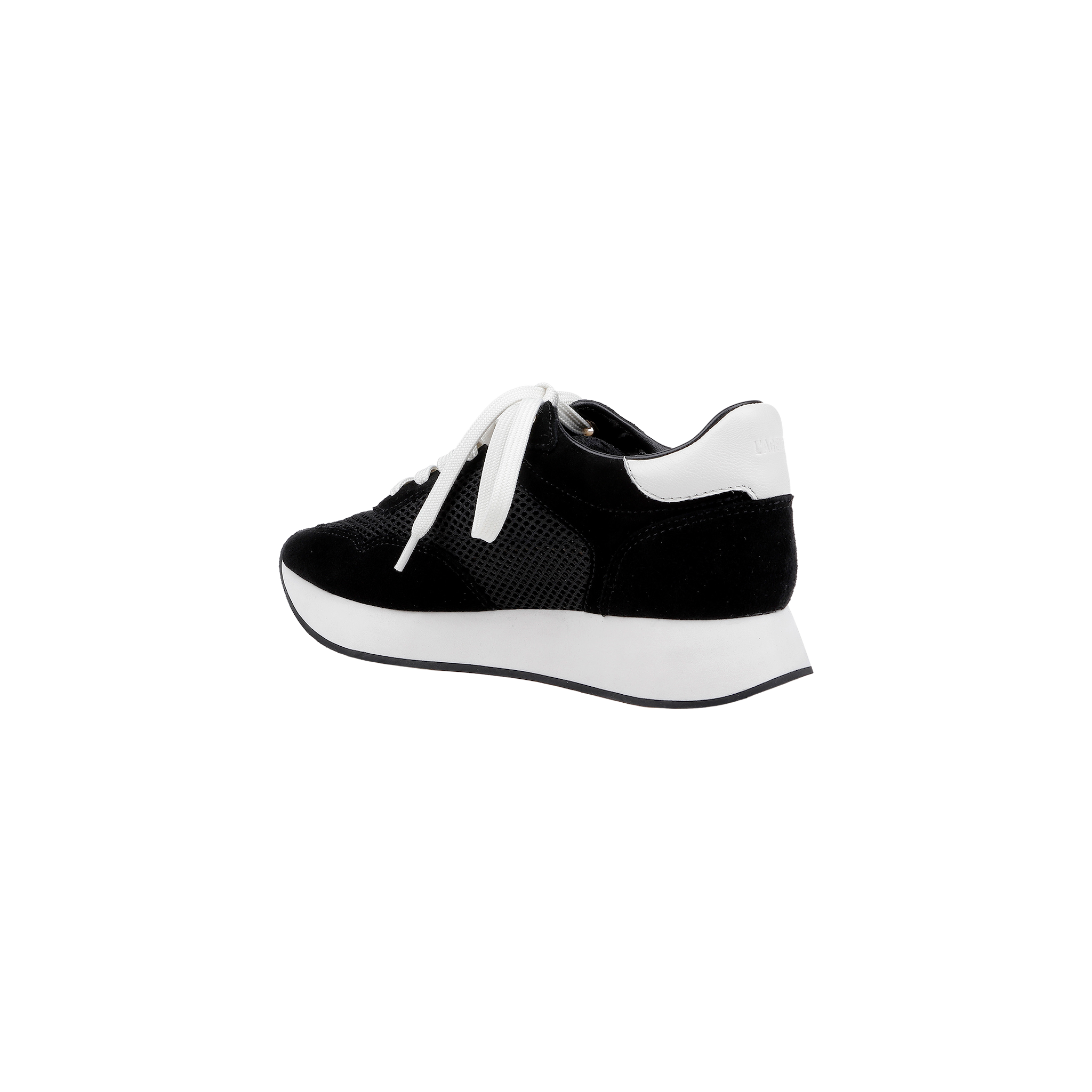 The Deepa Platform Sneaker, shown from a side angle on a plain white background, features black and white coloring with white laces, a thick white sole, a black suede finish, and a comfortable memory foam insole.