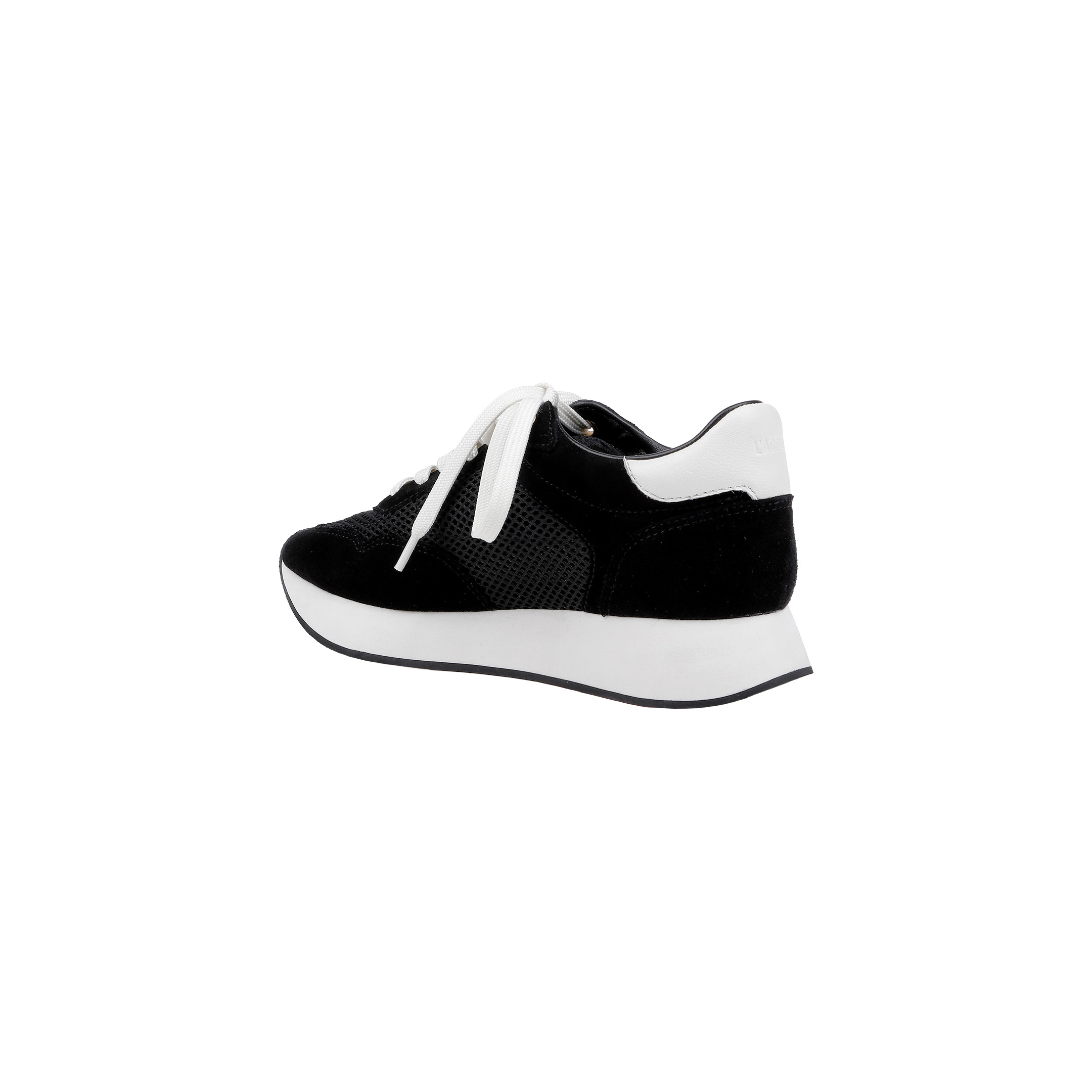 The Deepa Platform Sneaker, shown from a side angle on a plain white background, features black and white coloring with white laces, a thick white sole, a black suede finish, and a comfortable memory foam insole.
