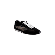 The Jarah Sneaker is a black suede sneaker with white laces, mesh side panels, and a black sole featuring a white stripe, shown against a plain white background. Designed with a memory foam insole for added comfort, these retro-inspired sneakers combine classic style and modern support.