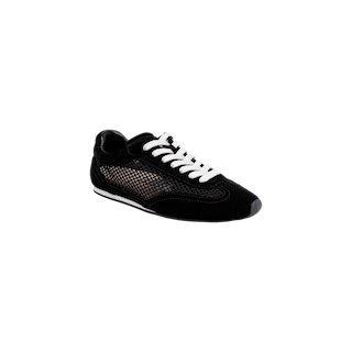 The Jarah Sneaker, featuring black suede, white laces, mesh side panels, and a low-profile sole, is displayed on a plain white background.