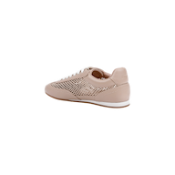 The Jarah Sneaker features a light pink colorway with a mesh side panel, white laces, and a crisp white sole with a slight platform. Subtle branding accents the heel, while its design merges retro-inspired sneaker elements with a sporty, casual aesthetic. The shoe is displayed against a plain white background.