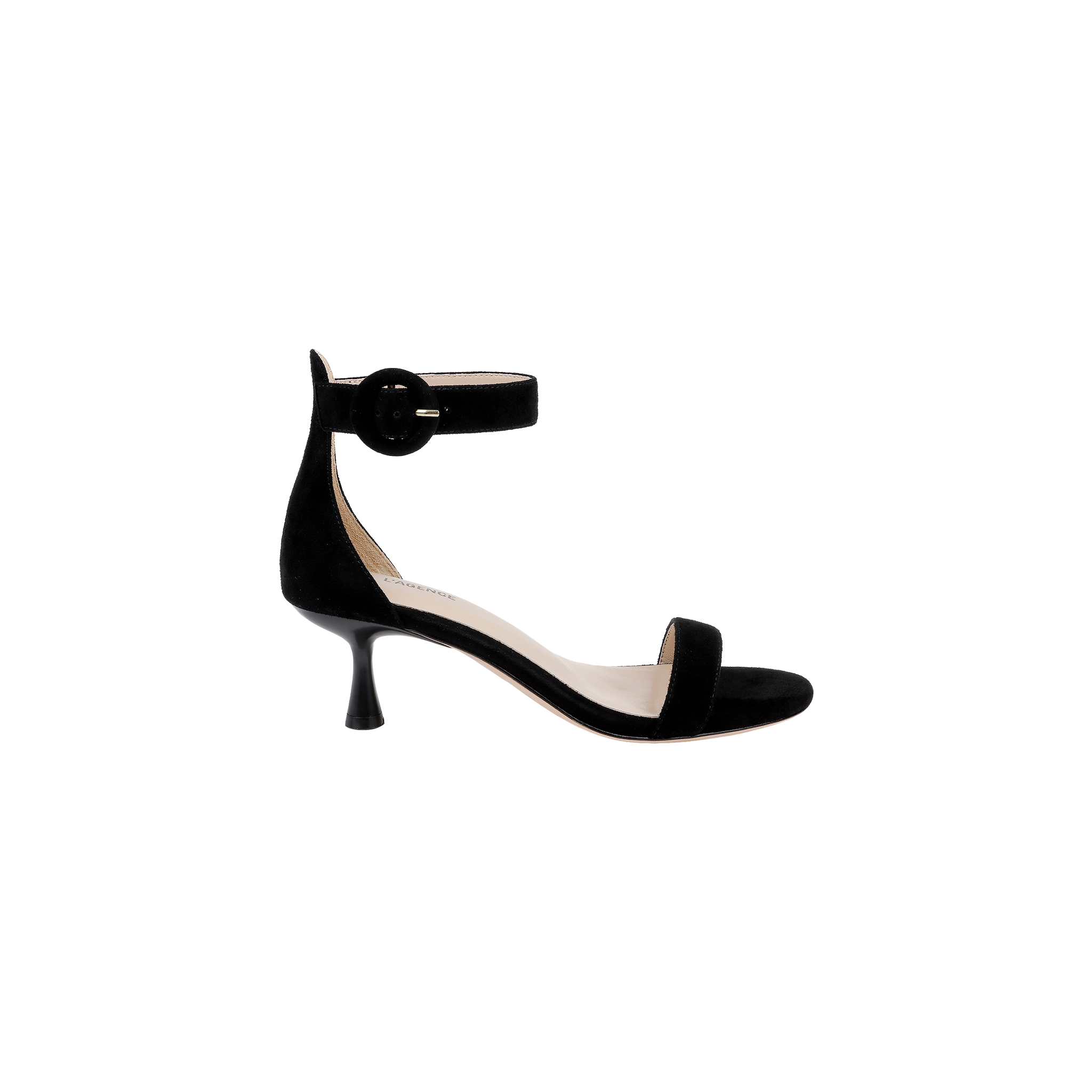 The Andelle Kitten-Heel Sandal in black suede features a flared low kitten heel, a single front strap, and a wide ankle strap accented with a large round buckle. Designed for comfort, it includes a memory foam insole. Displayed against a plain white background.