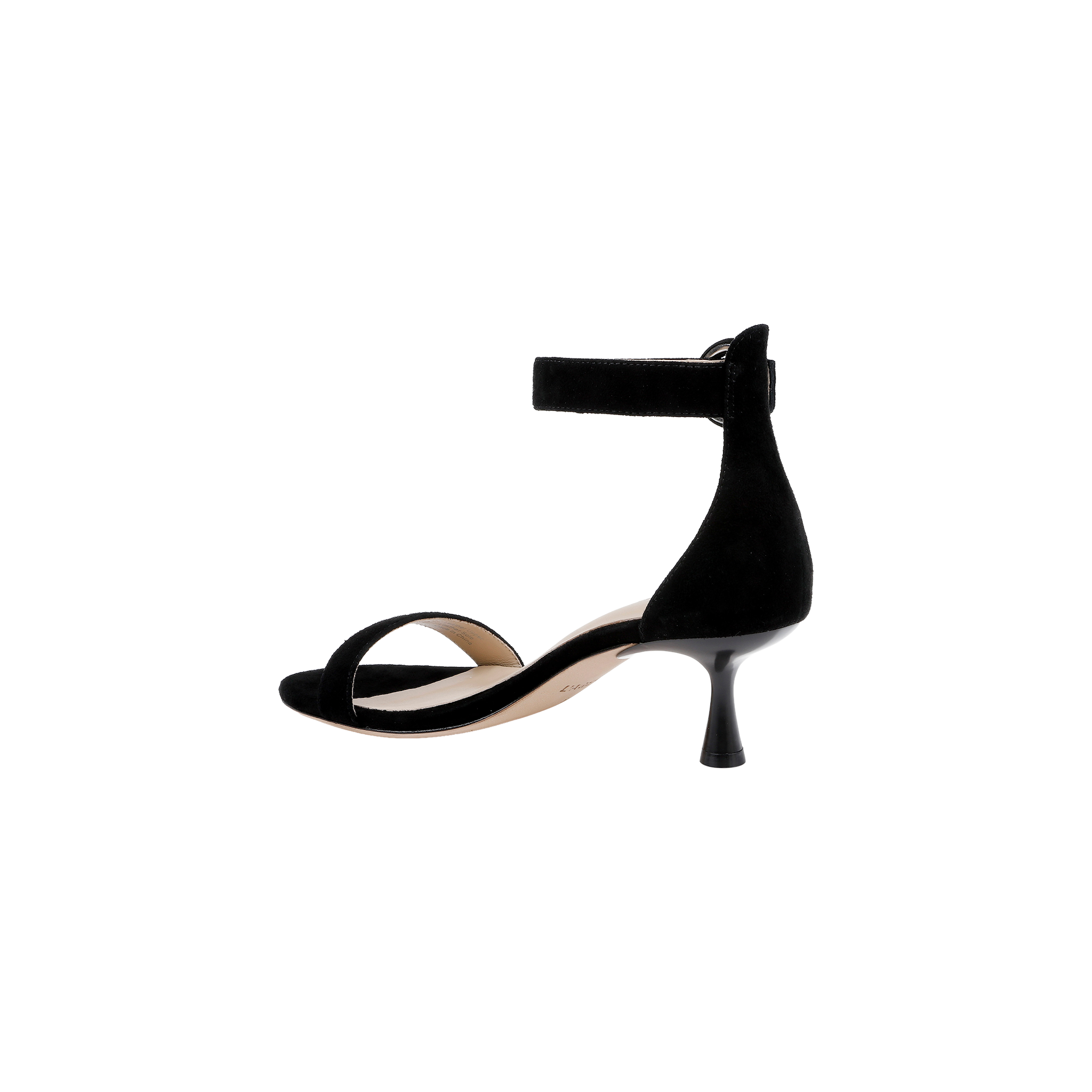 The Andelle Kitten-Heel Sandal in black suede showcases an open toe, a low curved kitten heel, and an ankle strap fastening, complemented by a memory foam insole. Shot in side profile against a plain white background.