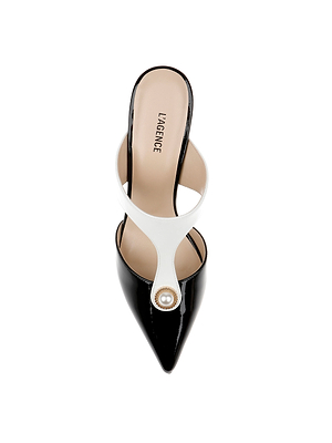 Top view of the Bayonne Mule: a black and white leather pointed-toe heel with a white front strap, decorative button, and beige insole labeled LAGENCE.