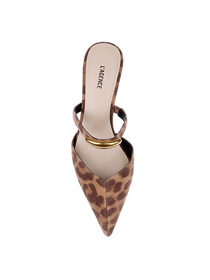 A top view of the Catania Kitten-Heel Pump shows a pointed-toe mule in brown leopard print suede, featuring a thin strap with a gold accent and LAGENCE on the insole, displayed on a white background.