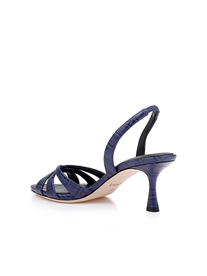 The Colwill Slingback Sandal is a single navy blue, croc-embossed leather shoe featuring strappy details, an open toe, and a slender mid heel, displayed against a white background.