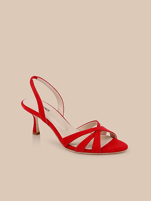 The Colwill Slingback Sandal features a red suede upper, crisscross straps, an open toe, and a chic mid heel, styled against a beige background.