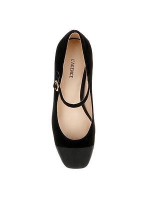 Top view of the Lilles Platform Pump: a single black Mary Jane with a rounded toe, platform sole, and thin buckle strap across the instep. Features a light beige insole branded 