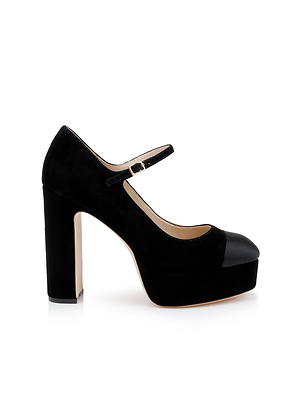 The Lilles Platform Pump is a black suede Mary Jane with a round toe, thick high heel, ankle strap and small buckle, plus a beige sole. Displayed on white background—ideal for those seeking stylish black suede heels.