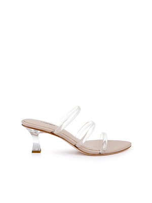 The Ludovica Kitten-Heel Sandal is a minimalist mule with three vinyl bands, a nude sole, and a short clear acrylic heel, shown against a plain white background.