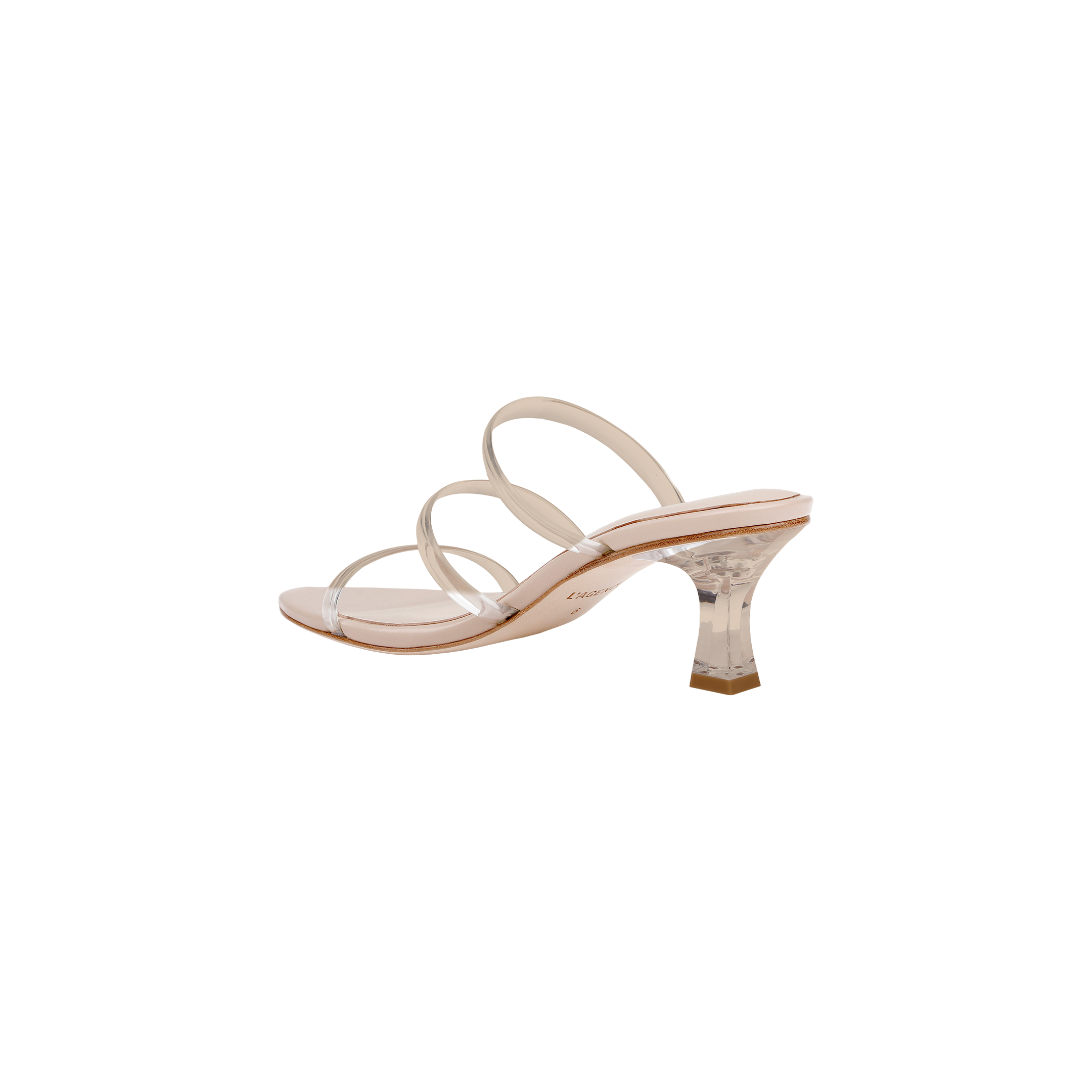 The Ludovica Kitten-Heel Sandal features three clear vinyl bands and a transparent, flared acrylic heel. Designed with a nude sole and a minimalist, modern silhouette inspired by the classic mule, this heeled sandal is photographed on a plain white background.