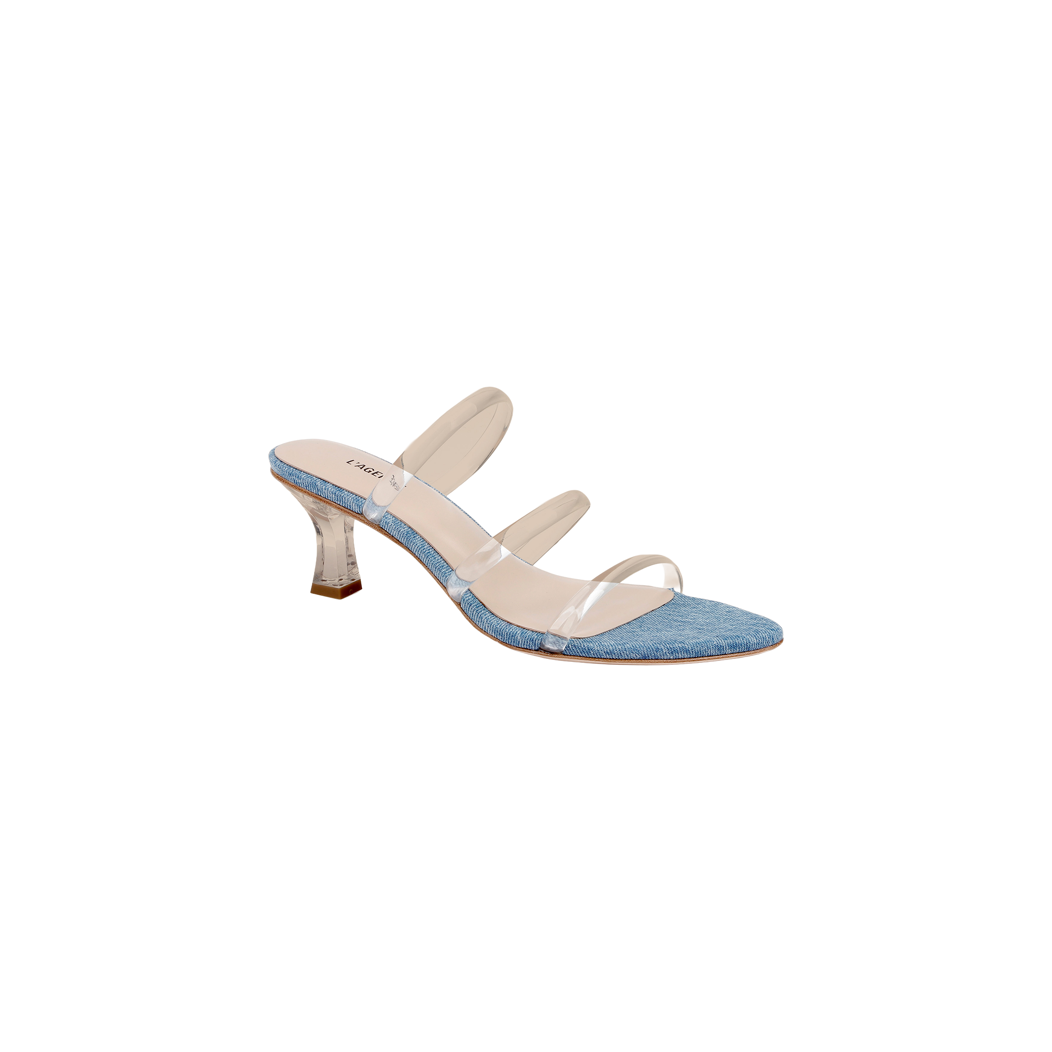 The Ludovica Kitten-Heel Sandal is a fashionable denim mule featuring a blue denim sole, three clear vinyl straps across the foot, and a translucent curved heel, displayed on a white background.