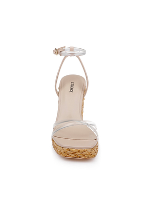 Front view of the Malone Wedge Espadrille: features clear toe and ankle straps with a buckle, nude footbed, braided raffia wedge platform sole, and LABELLE branding on the insole.