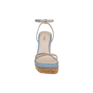 Front view of the Malone Wedge Espadrille, featuring a denim blue upper, beige ankle strap, tan sole, and a woven raffia wedge platform heel in a bohemian espadrille design, displayed on a plain white background.
