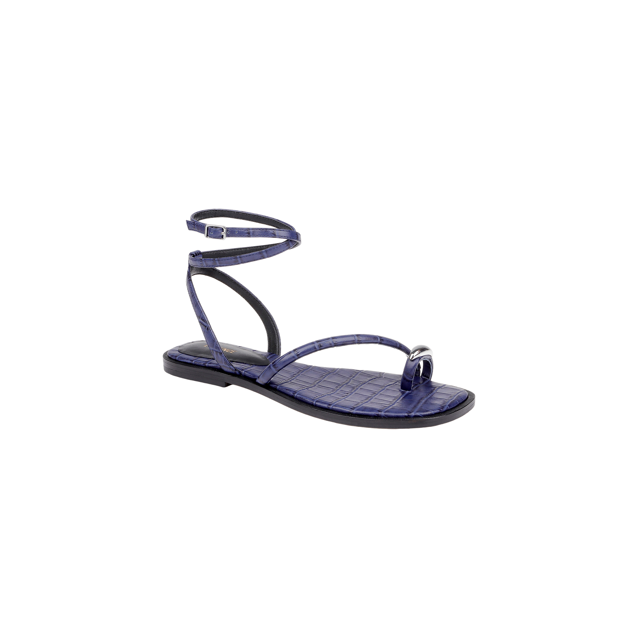 The Mariana Leather Sandal is a purple flat sandal featuring a crocodile texture, a toe ring, and a wraparound ankle tie strap, displayed against a plain white background.