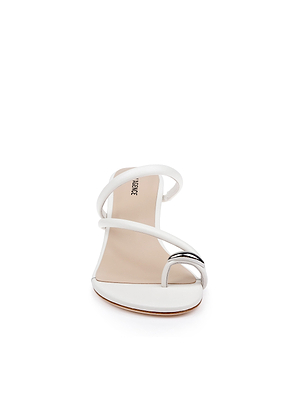 Front view of the Maritza Wedge Sandal in white, featuring a minimalist upper with two thin straps crossing over the toes and a silver metal accent on the front strap, set against a white background.