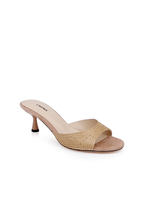 The Maryam Kitten-Heel Mule is a beige, open-toe sandal with a woven raffia upper, low stiletto heel, and cushioned insole. LAURENCE is printed on the insole. Shown on a white background.