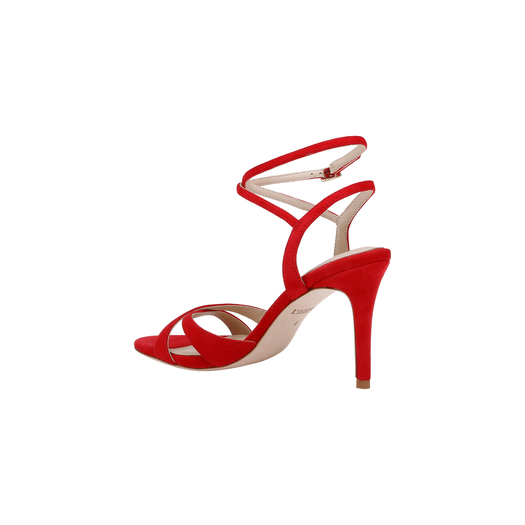 The Miranda Suede Sandal, crafted in vibrant red suede, features a stiletto heel, thin ankle-wrap straps with an adjustable buckle—an elegant evening shoe showcased on a plain white background.
