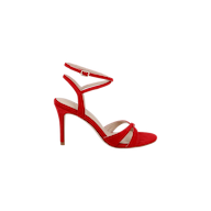 The Miranda Suede Sandal features an ankle-wrap strap, crisscross toe straps, and a slim heel, all crafted in striking red suede—perfect for evening wear. Shown on a white background.