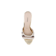 The Moyes Crochet Sandal is a gold open-toe heeled sandal featuring a sculpted heel and a woven cream and brown strap, shown from above on a white background. The insole is labeled LAGENCE.