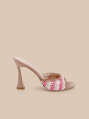 The Moyes Crochet Sandal is a stylish high-heeled mule with a beige sole, sculpted heel, and a wide woven strap in pink, white, and beige—ideal for effortless summer looks.
