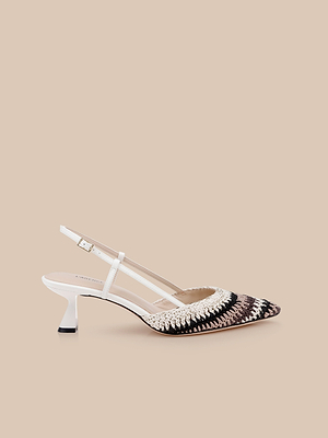 The Nantes Slingback Pump is a stylish womens shoe with a pointed toe and woven black, beige, and white pattern. It features a memory foam insole, white ankle strap, mid-height heel, and is shown on a light beige background.