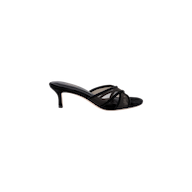 The Padua Mesh Sandal is a black open-toe mule with a mid-height heel, featuring thin crisscross straps and a suede finish. It includes a memory foam insole for added comfort and is shown in side profile on a plain white background.