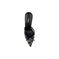 The Prasad Mesh Mule is a single black pointed-toe shoe featuring a sheer floral lace overlay, a front bow detail, and a branded LAGENCE insole, shown from above against a plain white background.