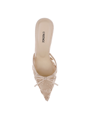 Top view of the Prasad Mesh Mule in beige, featuring a pointed toe, delicate butterfly embroidery, and a small bow at the front. L’AGENCE is stamped on the insole. Shoe displayed on a white background.