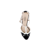 Radha Leather Sandal in black and white featuring a T-strap design, brogue detailing, and an ankle strap.