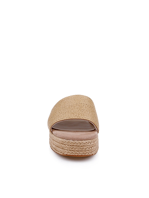 A front view of the Ramani Platform Espadrille sandal in beige raffia with an open toe and flat, textured sole against a white background—ideal for warm-weather style and fans of natural woven footwear.