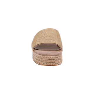 A front view of the Ramani Platform Espadrille, a beige woven slide sandal featuring a raffia upper and platform sole, perfect for warm-weather style, set against a white background.