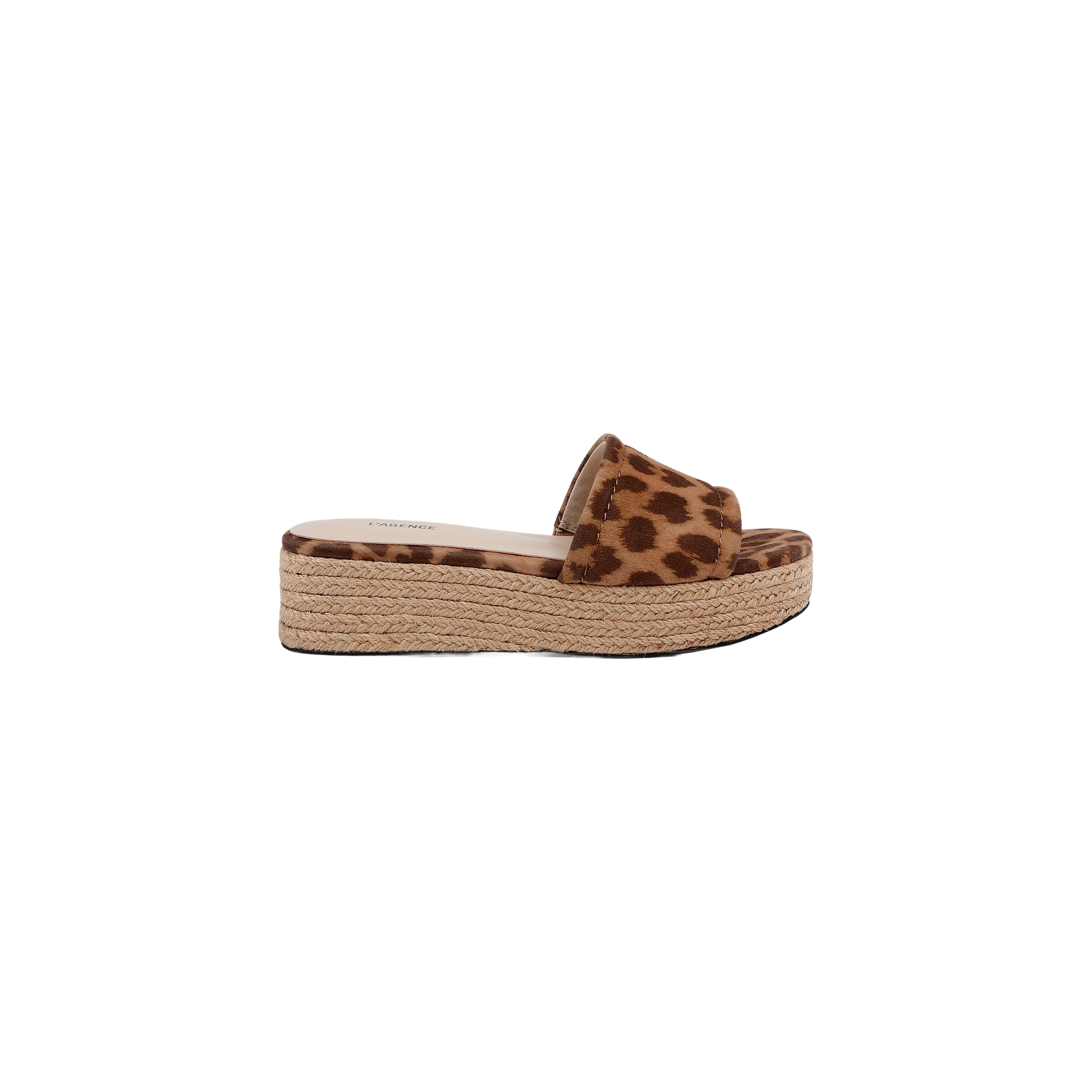 The Ramani Platform Espadrille is a single flat platform slide sandal featuring a brown and black leopard print suede strap and a braided jute sole, shown from the side on a white background—perfect for effortless summer style.