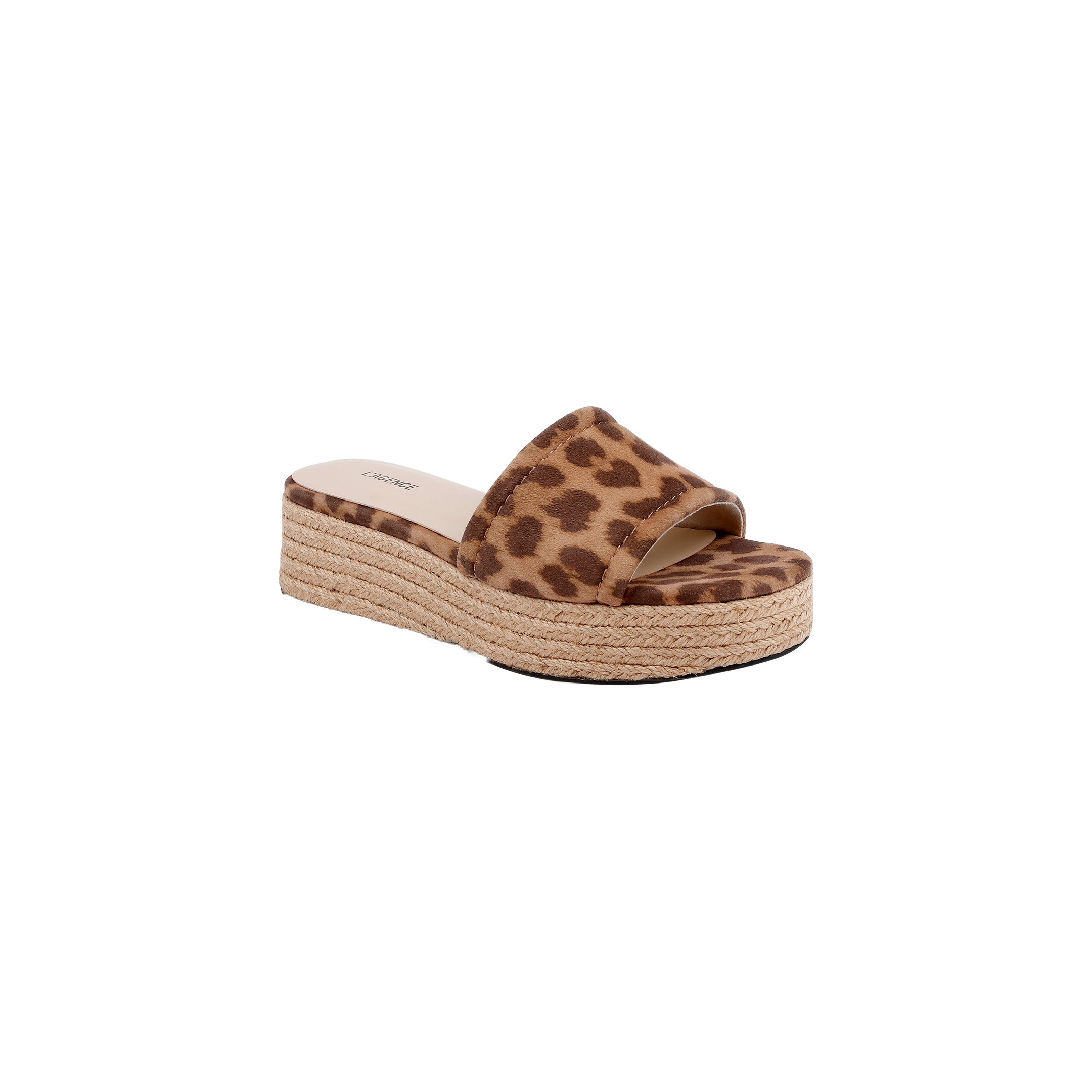 The Ramani Platform Espadrille is a stylish flat slide sandal featuring a leopard print suede strap and a woven sole, making it perfect for effortless summer style. Shown on a white background.