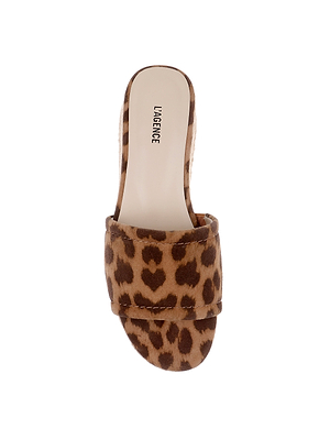 A single Ramani Platform Espadrille in brown and tan leopard-print suede, with open-toe slide design and LAGENCE branding on the insole, is shown from above against a white background.