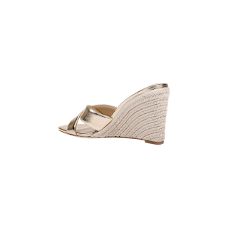 The Rosaline Wedge Espadrille is a gold leather sandal featuring an open toe design, a braided platform wedge heel, and is displayed in a side view against a plain white background.