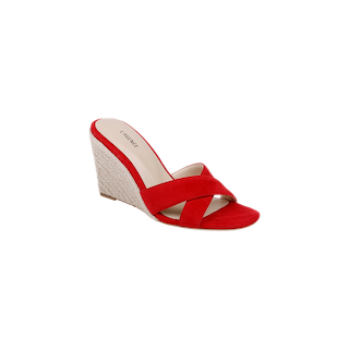 The Rosaline Wedge Espadrille is a single red suede sandal with crisscross suede straps and a woven espadrille platform wedge heel, featuring a comfortable memory foam insole, displayed on a white background.