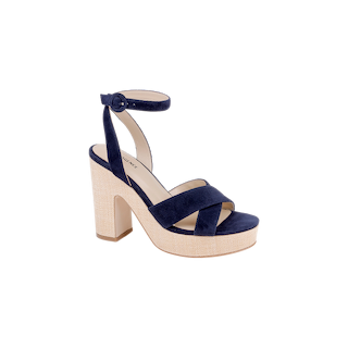 The Sandrine Platform Sandal features navy suede straps, an ankle strap with a buckle, and a chunky beige raffia-wrapped wedge heel for a stylish look.