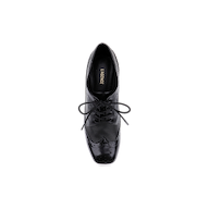 A top view of the Tania Oxford Pump in black, showcasing decorative perforations and stitching, with laces tied in a bow, placed on a white background.