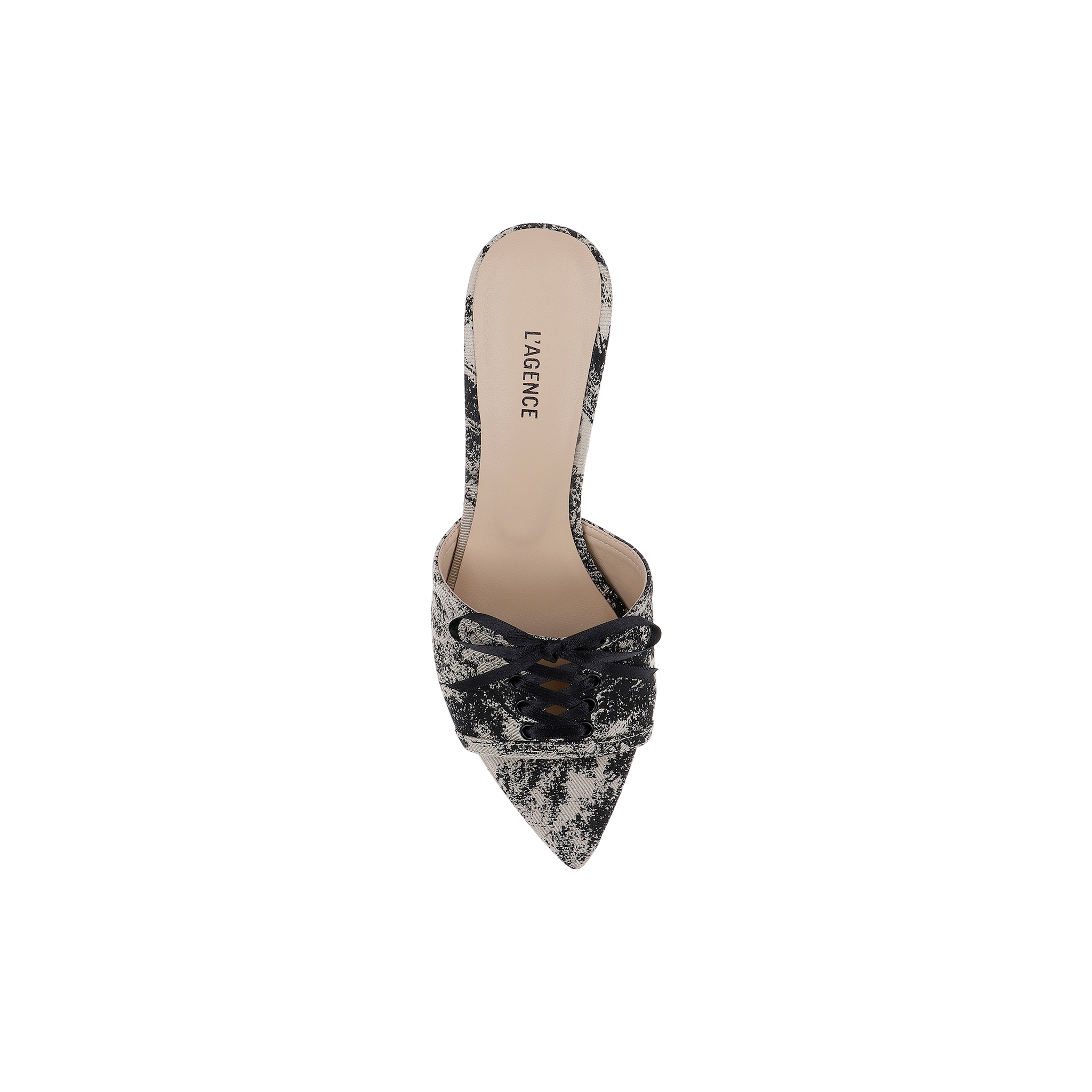 The Thames Sandal is a pointed-toe slip-on mule, adorned with black lace detailing and a small bow on the front. It features an elegant touch of jungle brocade, while the beige insole showcases the LAGENCE brand name.