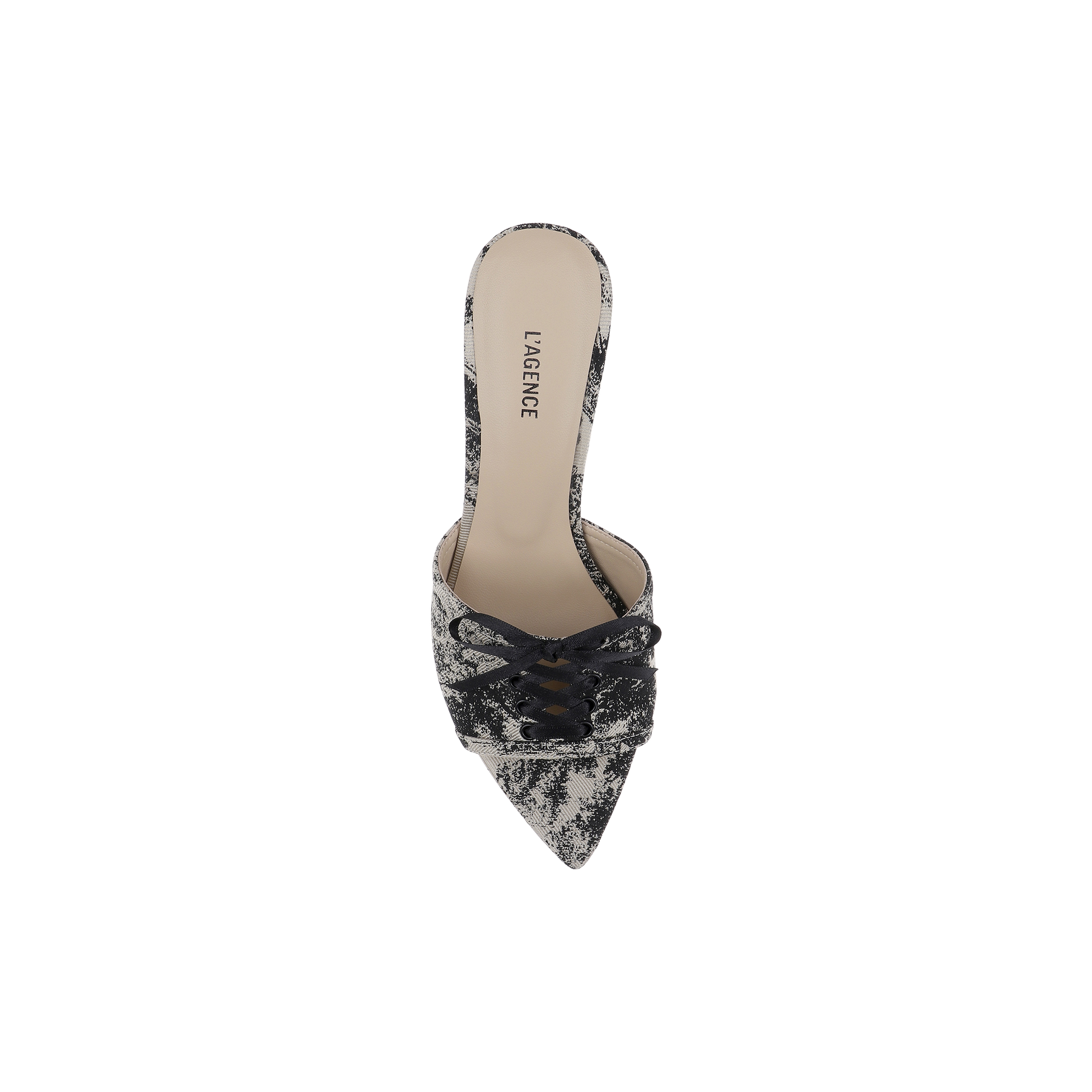 The Thames Sandal is a pointed-toe slip-on mule, adorned with black lace detailing and a small bow on the front. It features an elegant touch of jungle brocade, while the beige insole showcases the LAGENCE brand name.