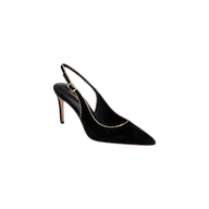 The Vichy Slingback Pump is a black suede stiletto with a pointed toe, thin stiletto heel, and elegant gold trim along the edges.